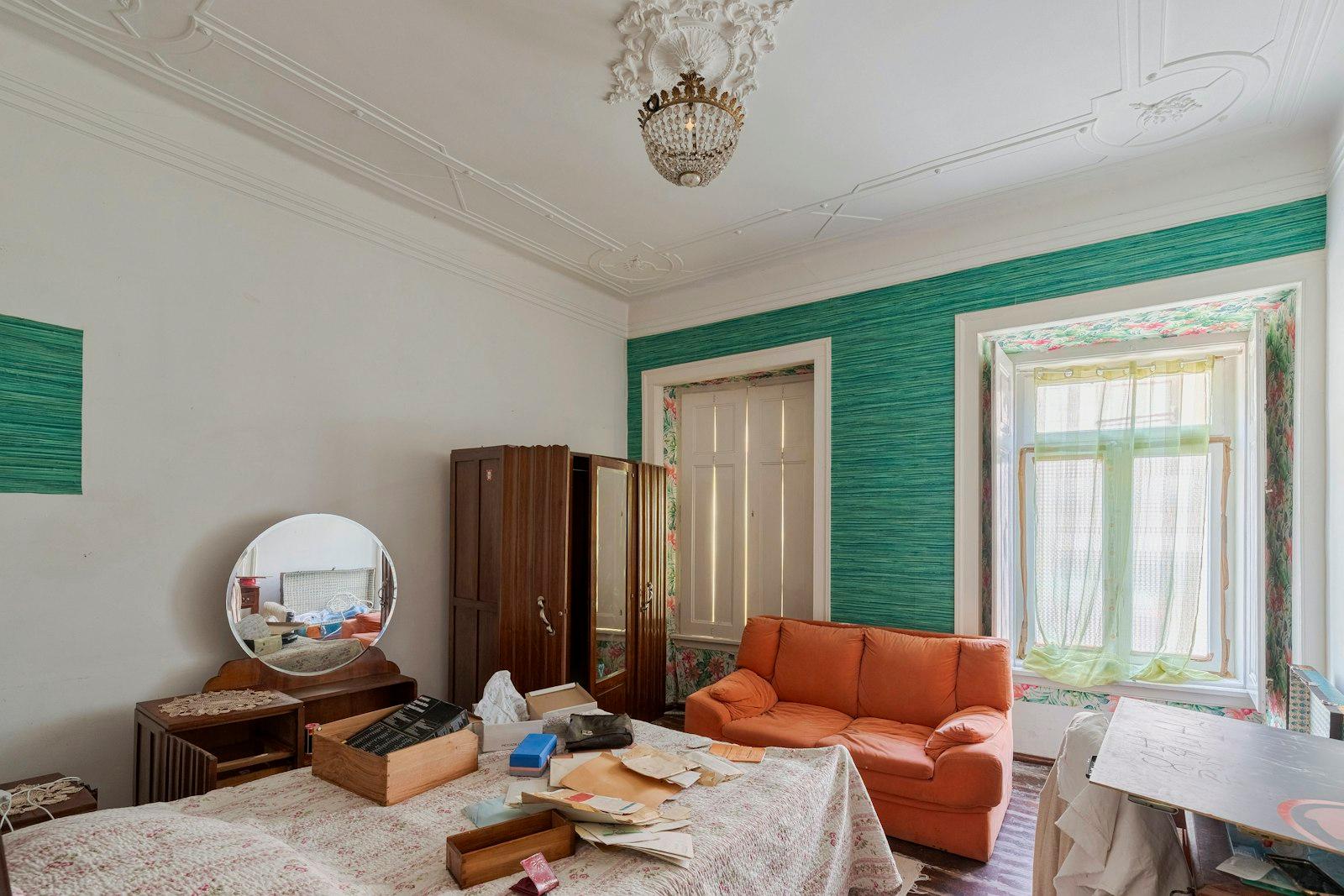 A room full of furniture and belongings